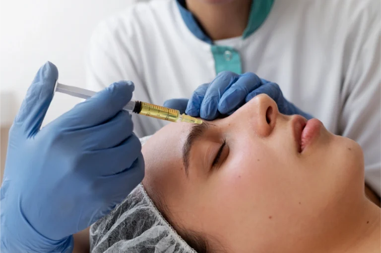 woman getting face prp treatment close up